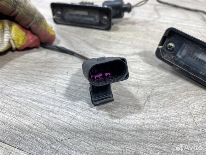 Фонарь подсветки номера VW Пассат Б6