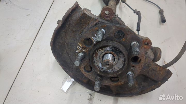 Ступица (кулак, цапфа) левая передняя SsangYong Rexton