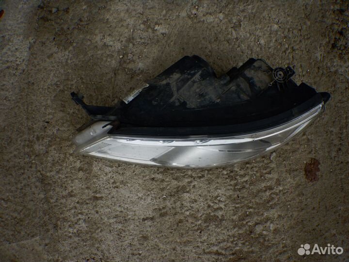 Фара левая Volkswagen Tiguan