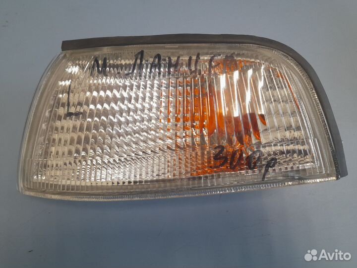 Указатель поворота левый белый mitsubishi lancer 9