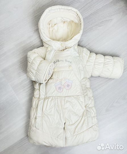 Продам зимний комбинезон на девочку как новый