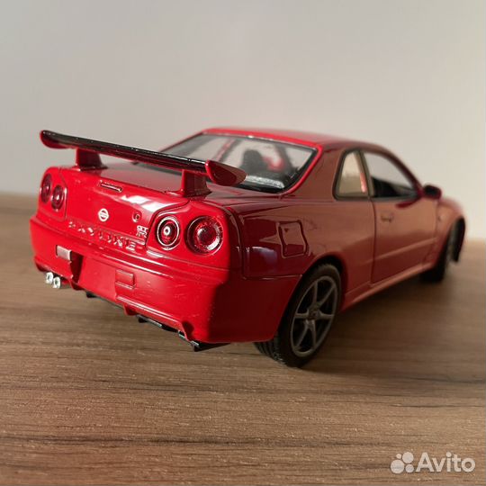 Модель Nissan Skyline GT-R R34 Welly 1:24