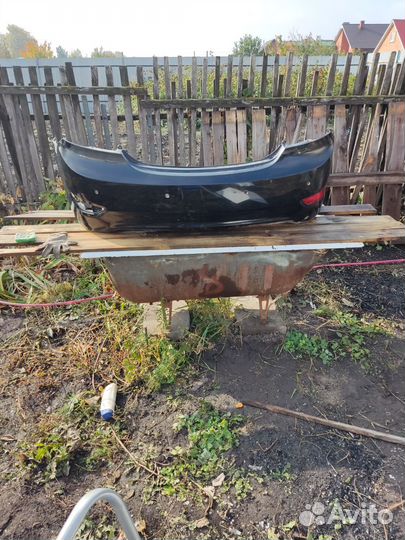 Задней бампер hyundai solaris чёрный