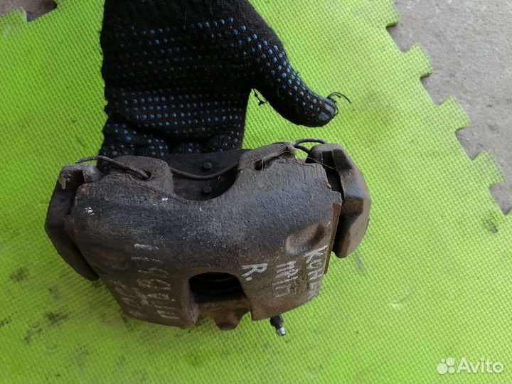 Суппорт передний правый Форд Торнео Коннект