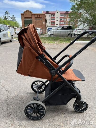 Прогулочная коляска luxmom с перекладной ручкой