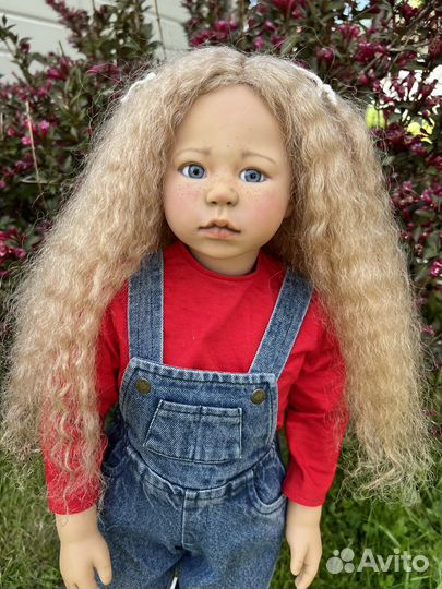 Виниловая кукла