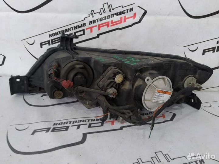 Фара honda odyssey RB1 RB2 10022497 xenon левая пр
