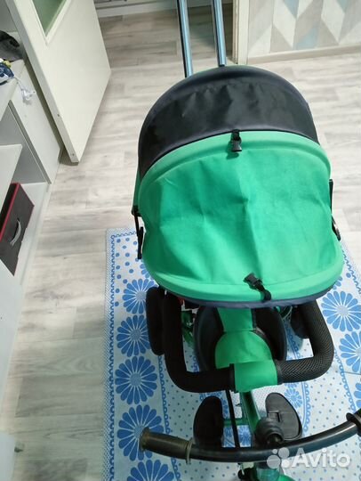 Трехколесный велосипед с ручкой