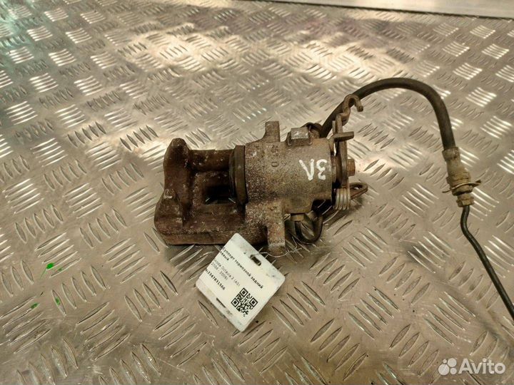 Суппорт тормозной задний левый Skoda Octavia