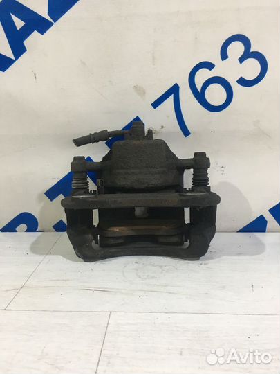 Суппорт передний левый hyundai solaris 2 1.4 мт се