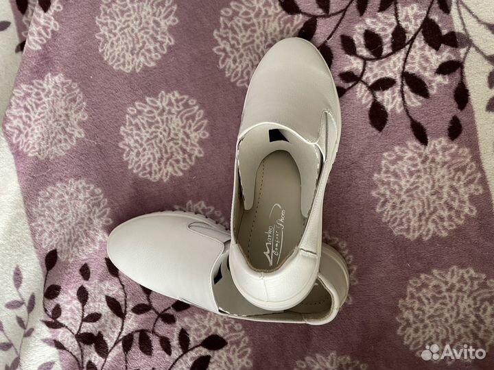 Новые кожаные туфли