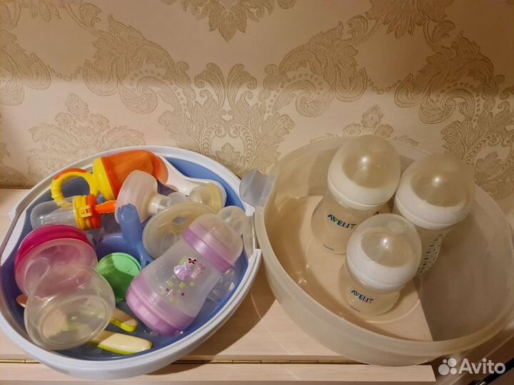 Молокоотсос+бутылочки+все на фото