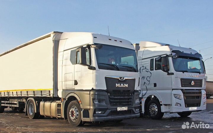 Водитель-дальнобойщик с категорией Е