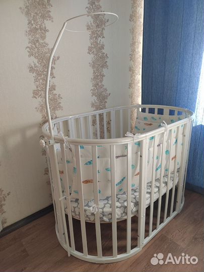 Детская кроватка с поперечным маятником