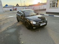 Kia Rio 1.4 AT, 2011, 220 000 км, с пробегом, цена 787 000 руб.