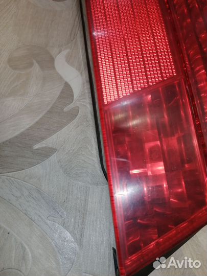 Фонарь задний левый Бмв е38