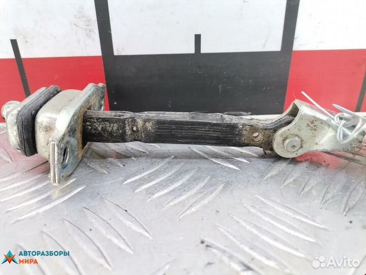 Ограничитель открывания двери Mitsubishi L200 3