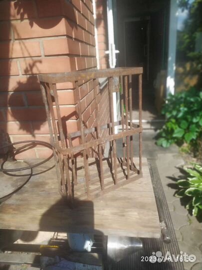 Сетка для камней вокруг трубы банной печки