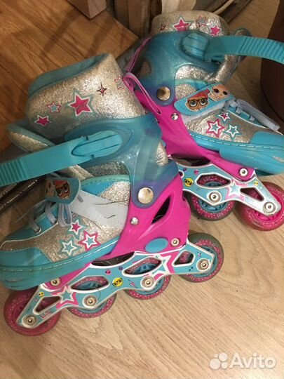 Роликовые коньки