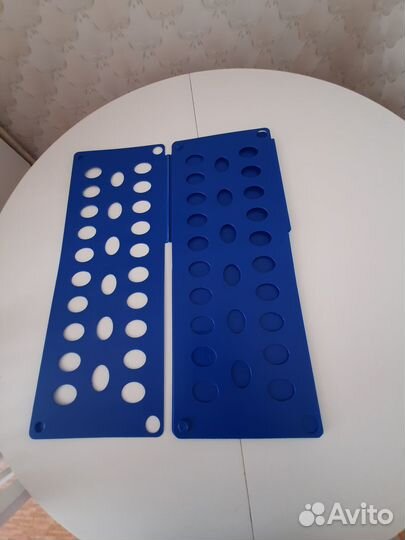 Приспособление для складывания одежды и белья