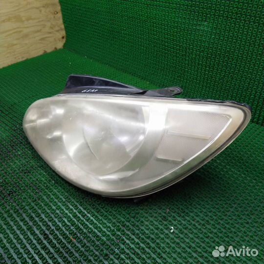 Фара левая Hyundai Getz рест. 2009 921011C501