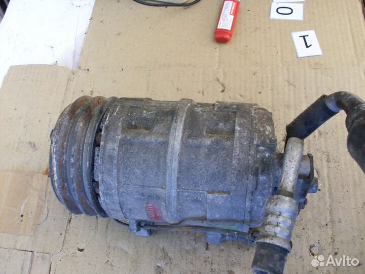 Компрессор кондиционера на Isuzu Bighorn