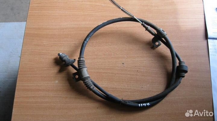 Трос стояночного тормоза Mitsubishi Galant Fortis