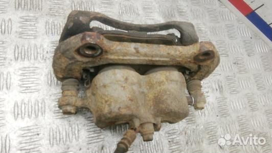 Суппорт тормозной передний левый KIA sorento 2 (4S