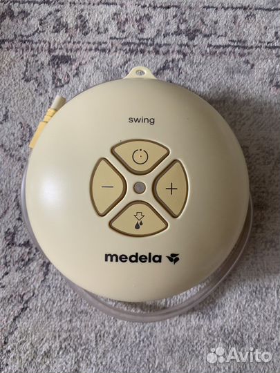 Молокоотсос medela