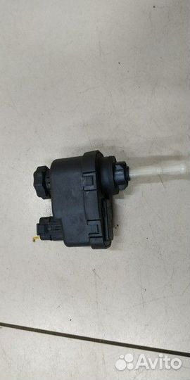 Моторчик корректора фары Opel Astra