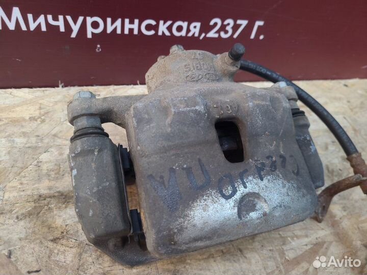 Суппорт тормозной передний левый Kia Ceed JD