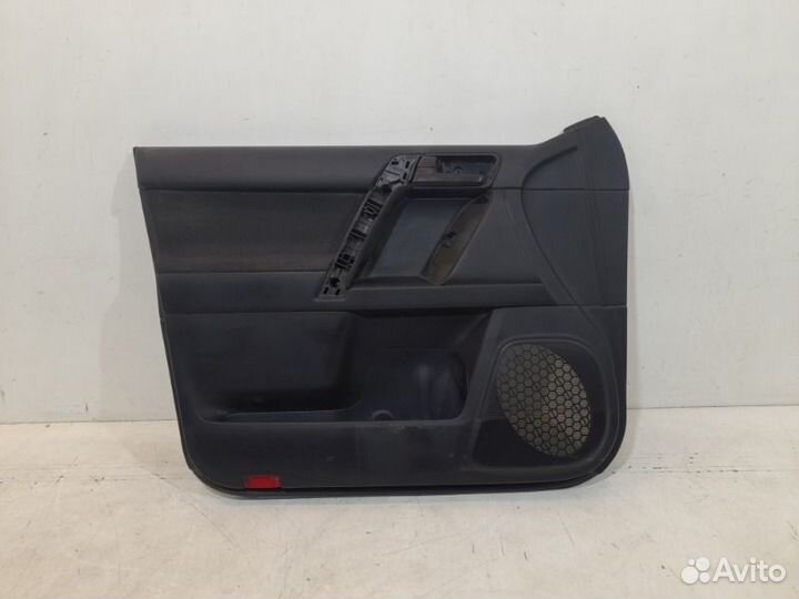 Обшивка двери передняя левая Toyota Land Cruiser