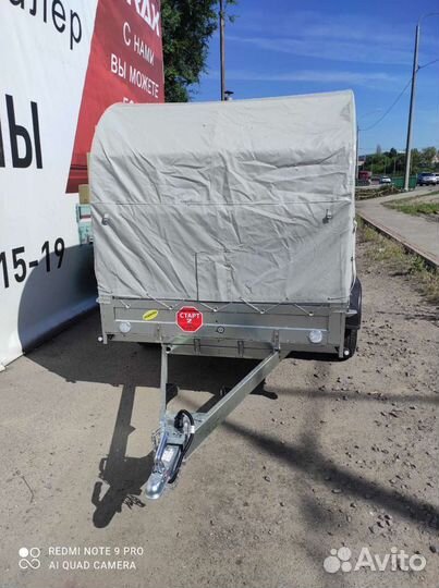 Двухосный легковой прицеп с тентом