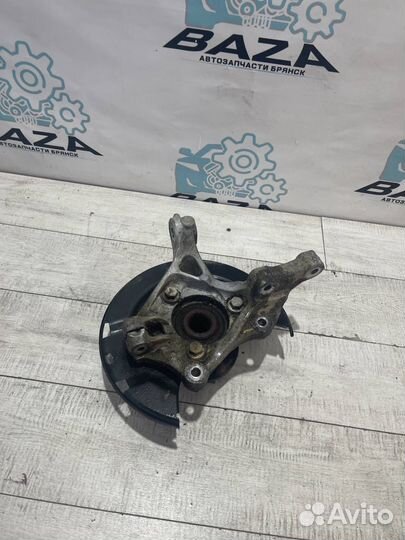 Кулак передний левый Chevrolet Cruze