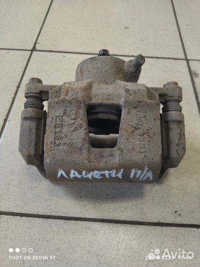 Суппорт тормозной передний левый Chevrolet Lacetti