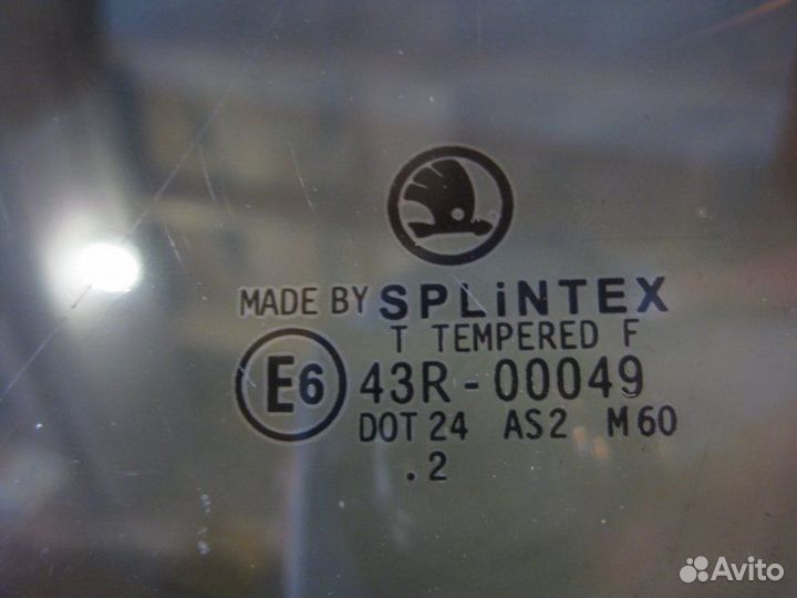 Стекло двери заднее левое Skoda Octavia Tour