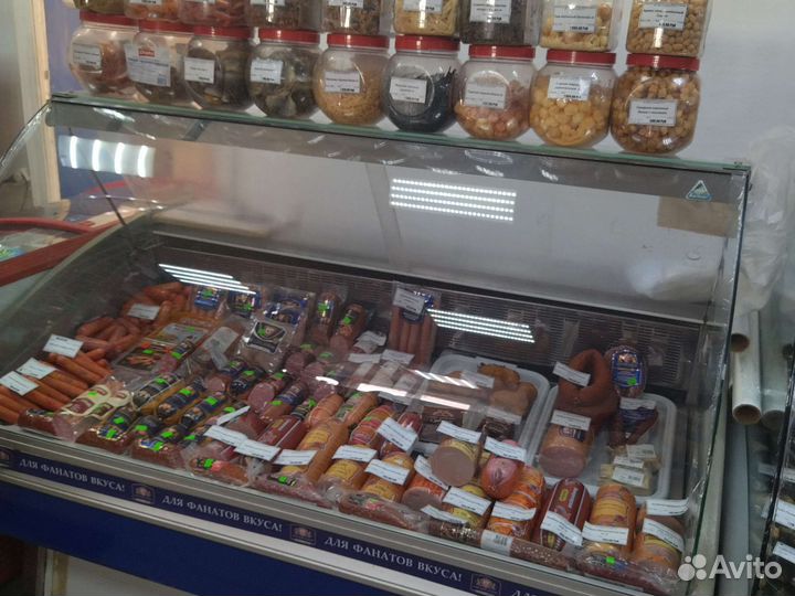 Продавец кассир в продуктовый магазин