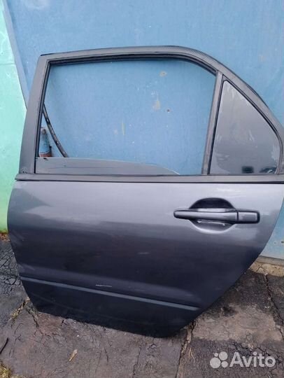 Дверь задняя lancer 9