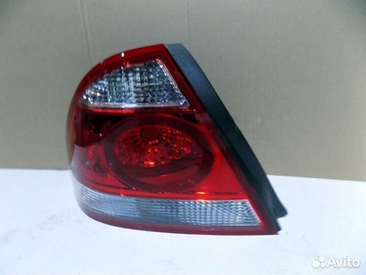Фонарь задний левый Ниссан Альмера Классик 2007-13