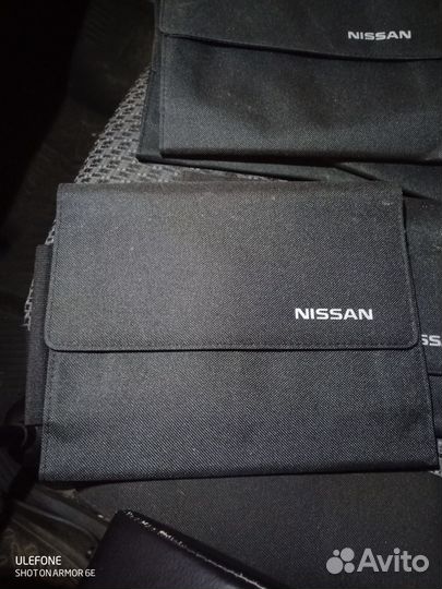 Nissan сумка-планшеька
