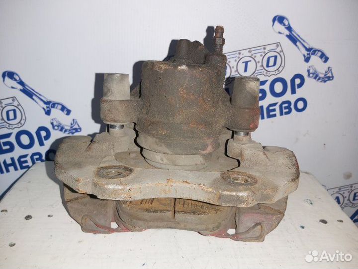 Суппорт тормозной правый Ford Focus 2