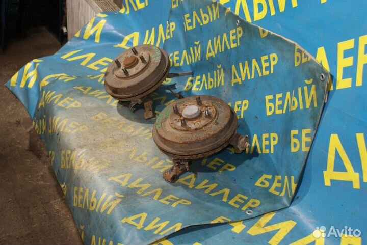 Задний поворотный кулак Mazda 323F BA