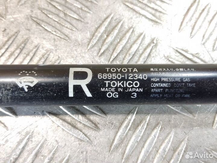 Амортизатор двери багажника Toyota Corolla e10