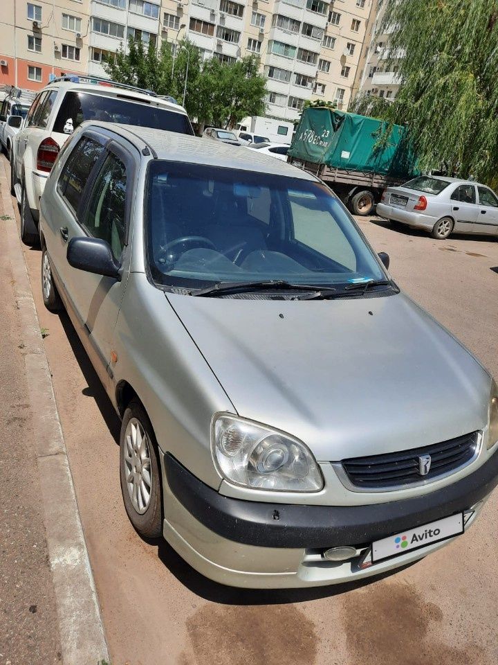 Toyota Raum: фото владельца
