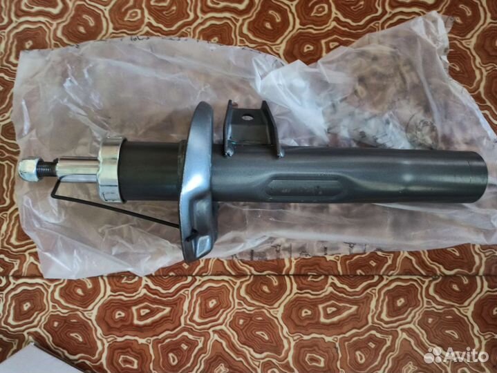 Стойка амортизатора