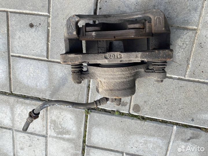 Тормозной суппорт передний правый Chevrolet