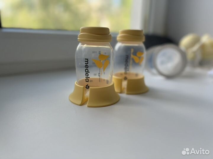 Молокоотсос medela электрический