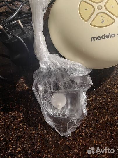 Молокоотсос medela электрический