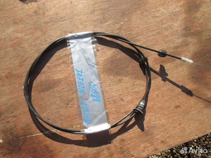 Трос капота Toyota Corolla Fielder NZE141 1NZ-FE