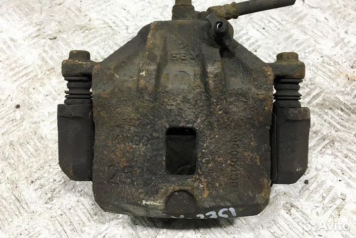 Скоба суппорта переднего Hyundai Coupe